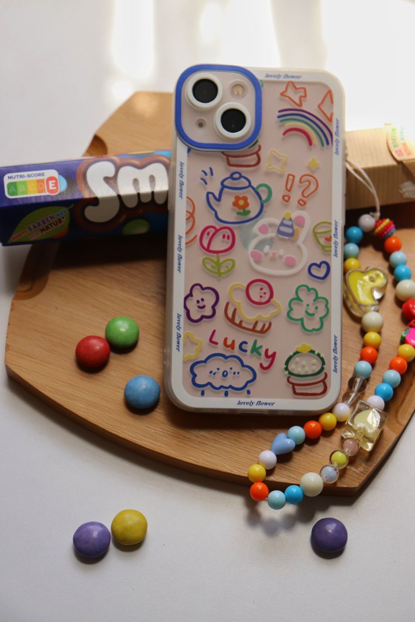 قاب موبایل آیفون لاکی پاستیلی پشت بیرنگ + بندست