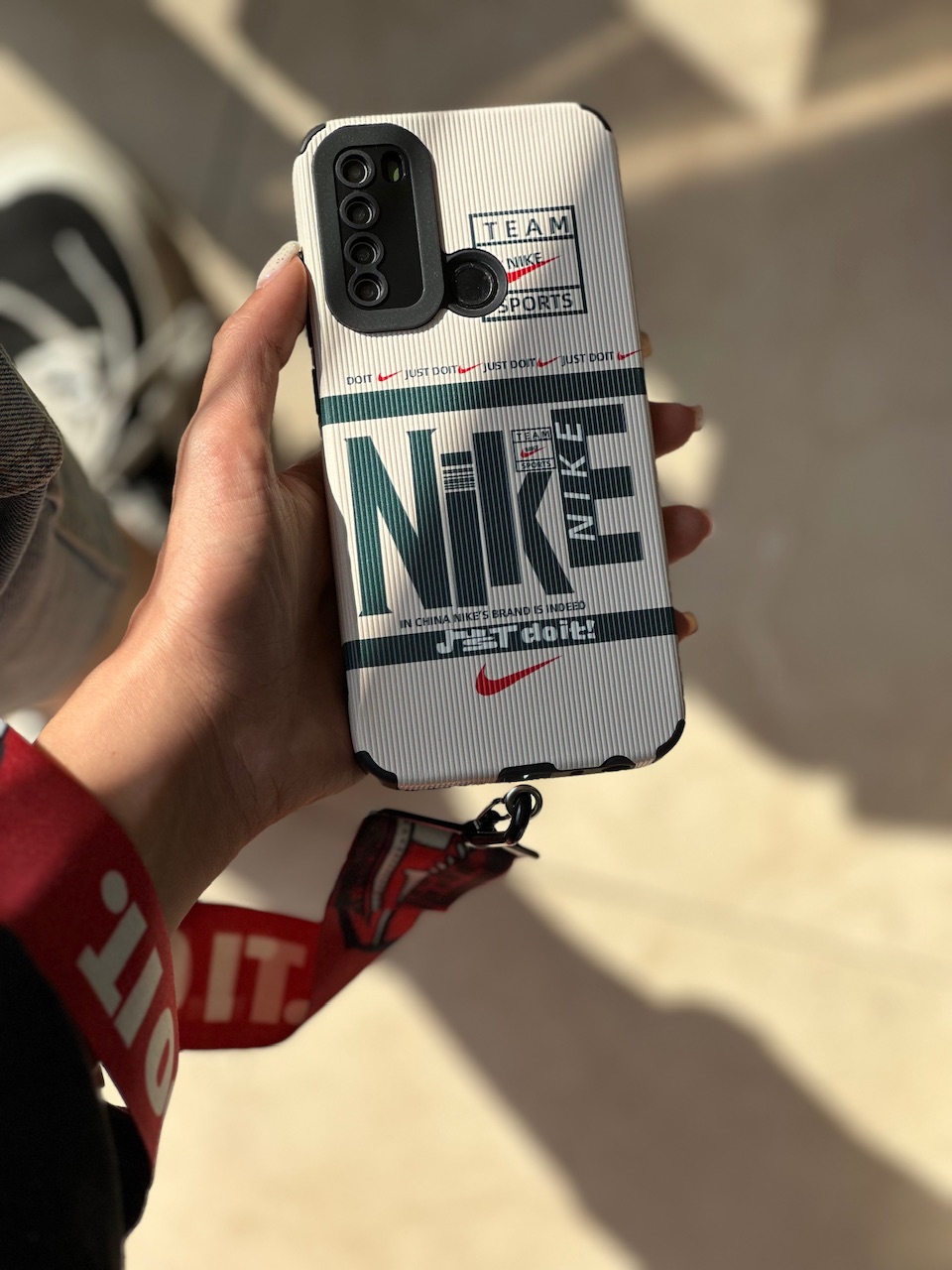 بند گوشی نایک قرمز