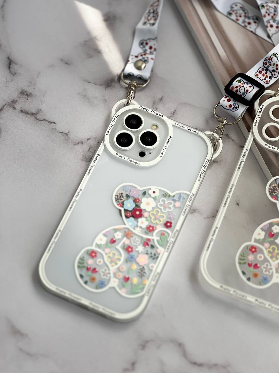 قاب آیفون خرس پشت بیرنگ + بند آویز بلند