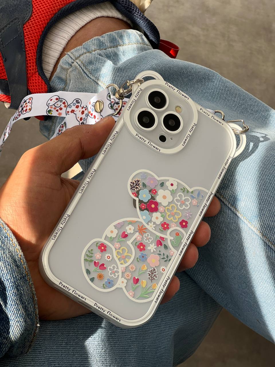 قاب آیفون خرس پشت بیرنگ + بند آویز بلند