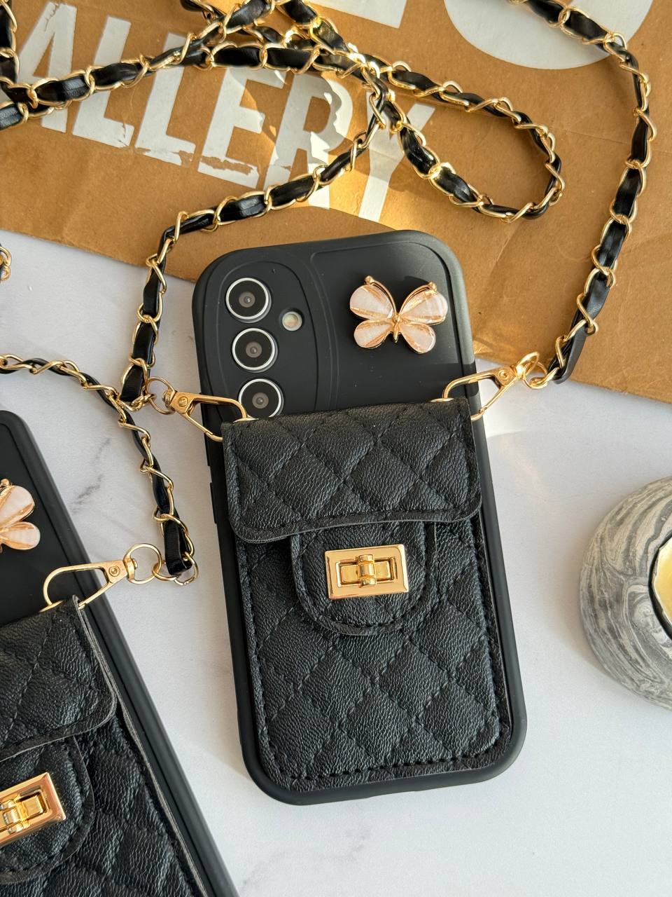 قاب آیفون بالشتی پروانه ای جاکارتی دار