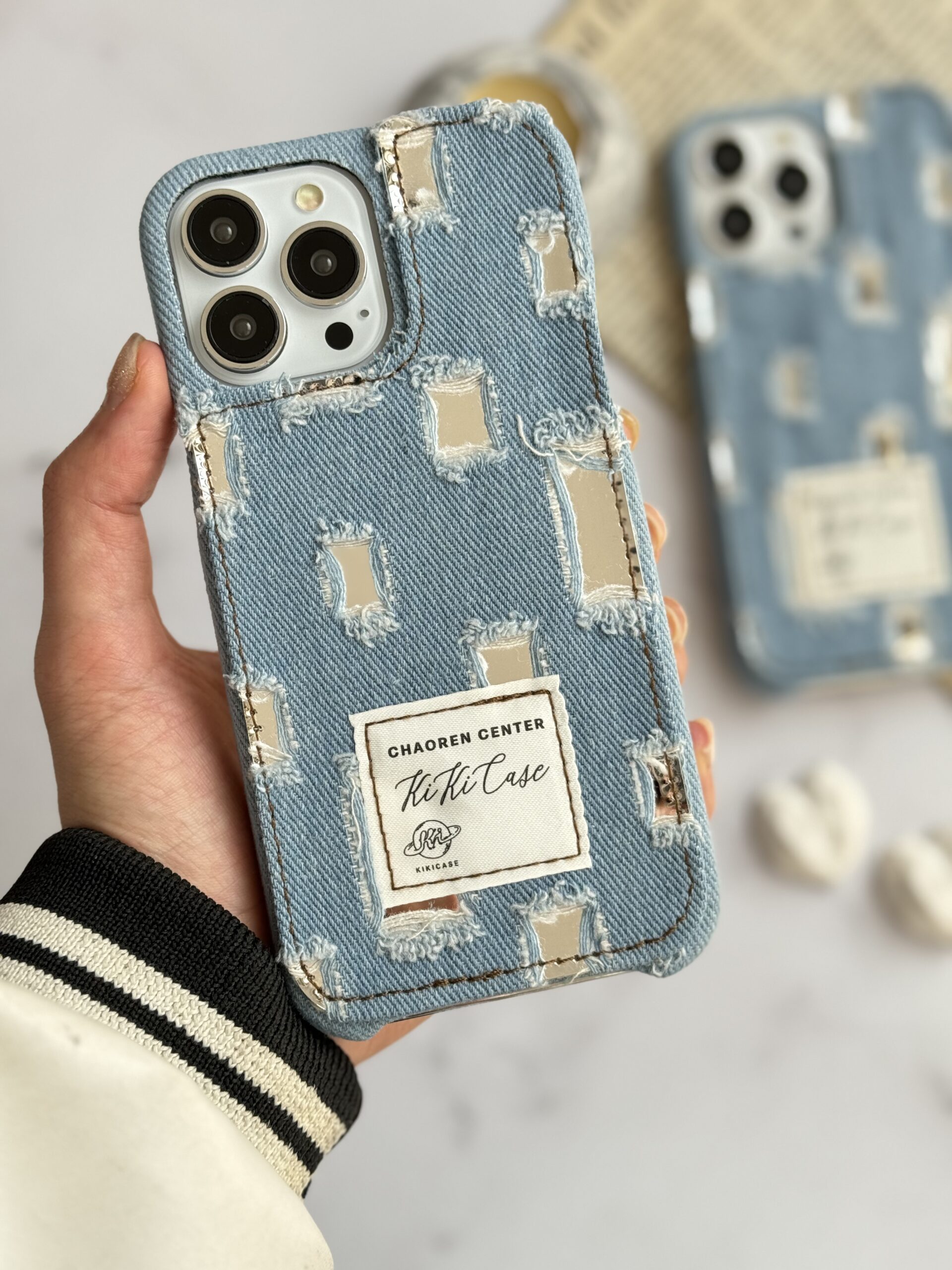 قاب موبایل آیفون جین و پارچه زاپ دار