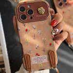 قاب موبایل آیفون گل دریایی جیر سنگشور قهوه ای + بند ست